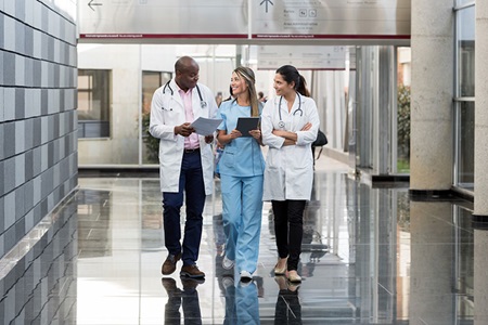 Doctors walking down hallway