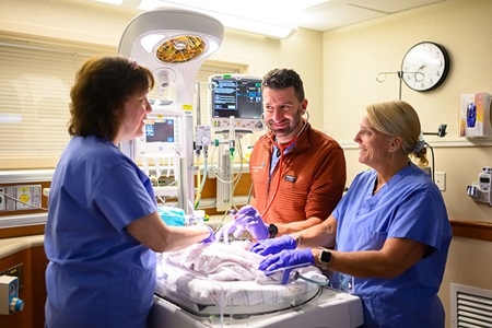 Doctor and Nurses in the Dr. Peter Rotolo Labor and Delivery Unit